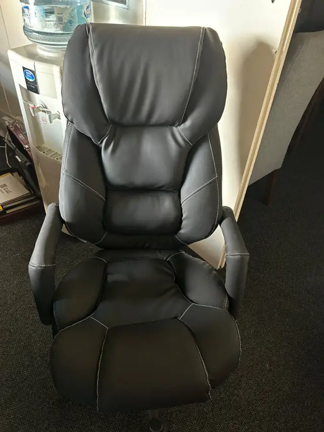 A black leather office chair