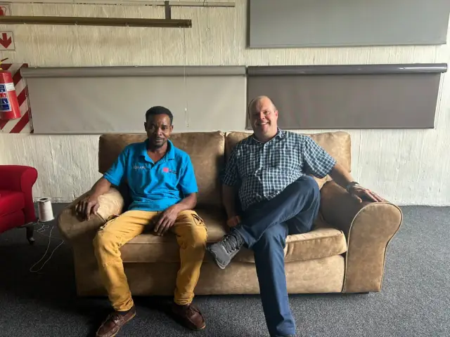 William Webb and a member of the team, in the showroom